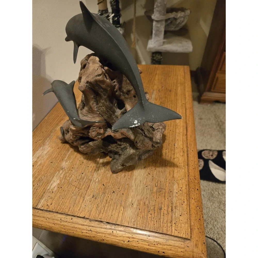John Perry dolphin figurine‎